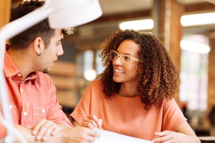 Two people engaged in a friendly conversation.