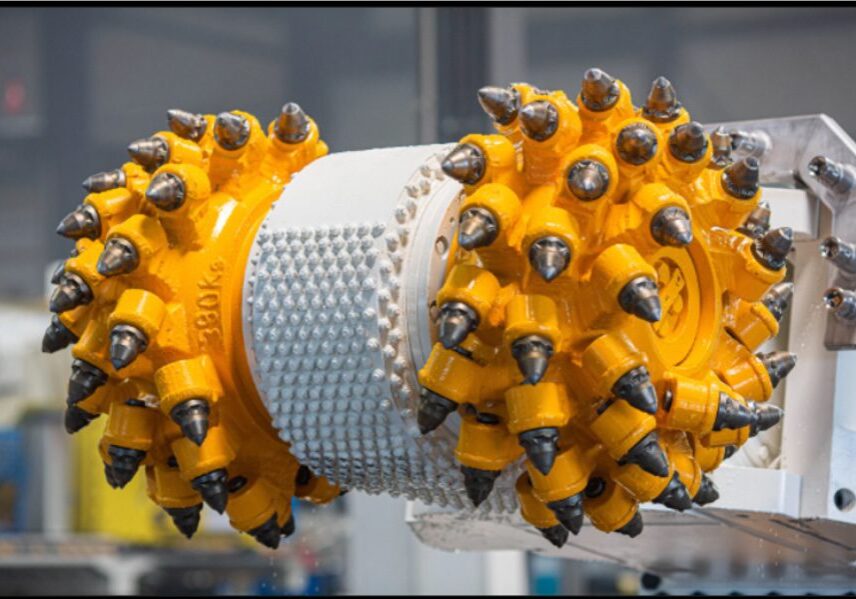 Industrial drilling tool with sharp metal teeth.